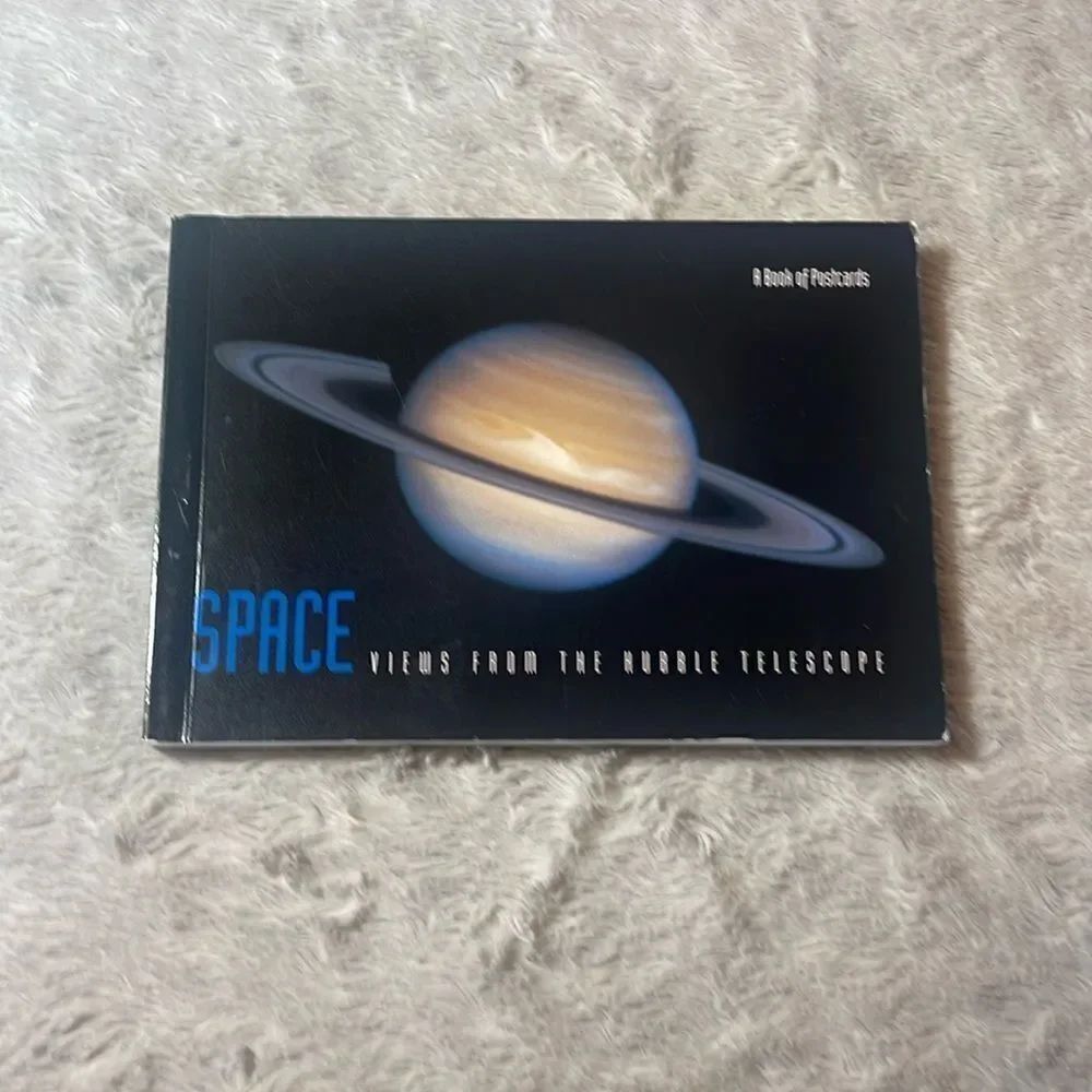 Space views from the Hubble telescope, a book of postcards